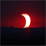 Astronomy Picture of the Day:  A Partial Eclipse Over Manila Bay