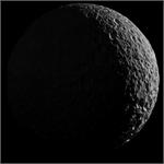 Mimas in Saturnlight